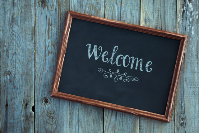 Make your front porch more welcoming with a chalkboard sign