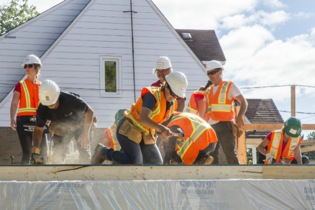 Monday’s crew prepares to raise exterior wall.